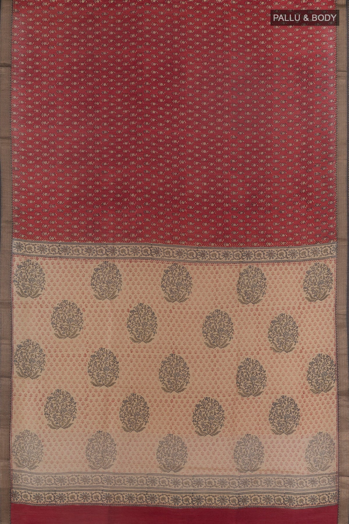 Flat view of Rust Tussar Saree with Printed design on the body and Zari Border. 