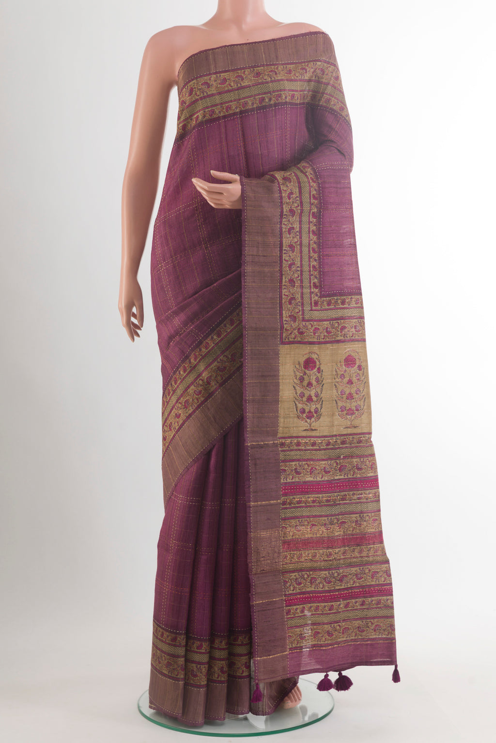 Mauve Tussar Saree with Checked design on the body and Zari Border.  displayed on a mannequin