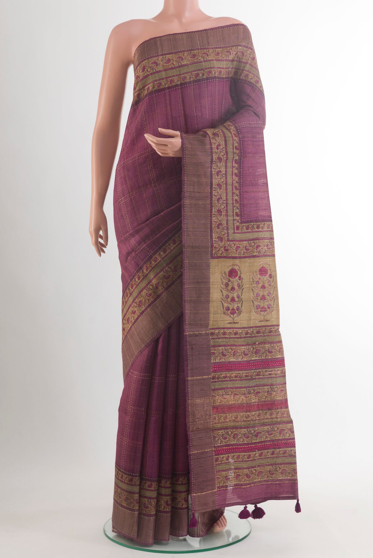 Mauve Tussar Saree with Checked design on the body and Zari Border.  displayed on a mannequin
