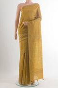 Mustard Tussar Saree with Zari Butta on the body and Zari Border.  displayed on a mannequin