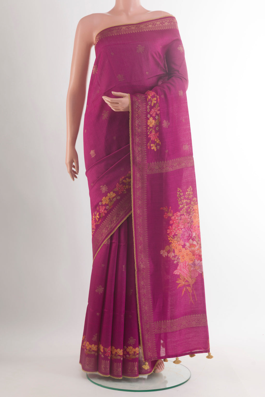 Light Magenta Tussar Saree with Thread Butta on the body and Zari Border.  displayed on a mannequin