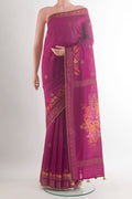 Light Magenta Tussar Saree with Thread Butta on the body and Zari Border.  displayed on a mannequin