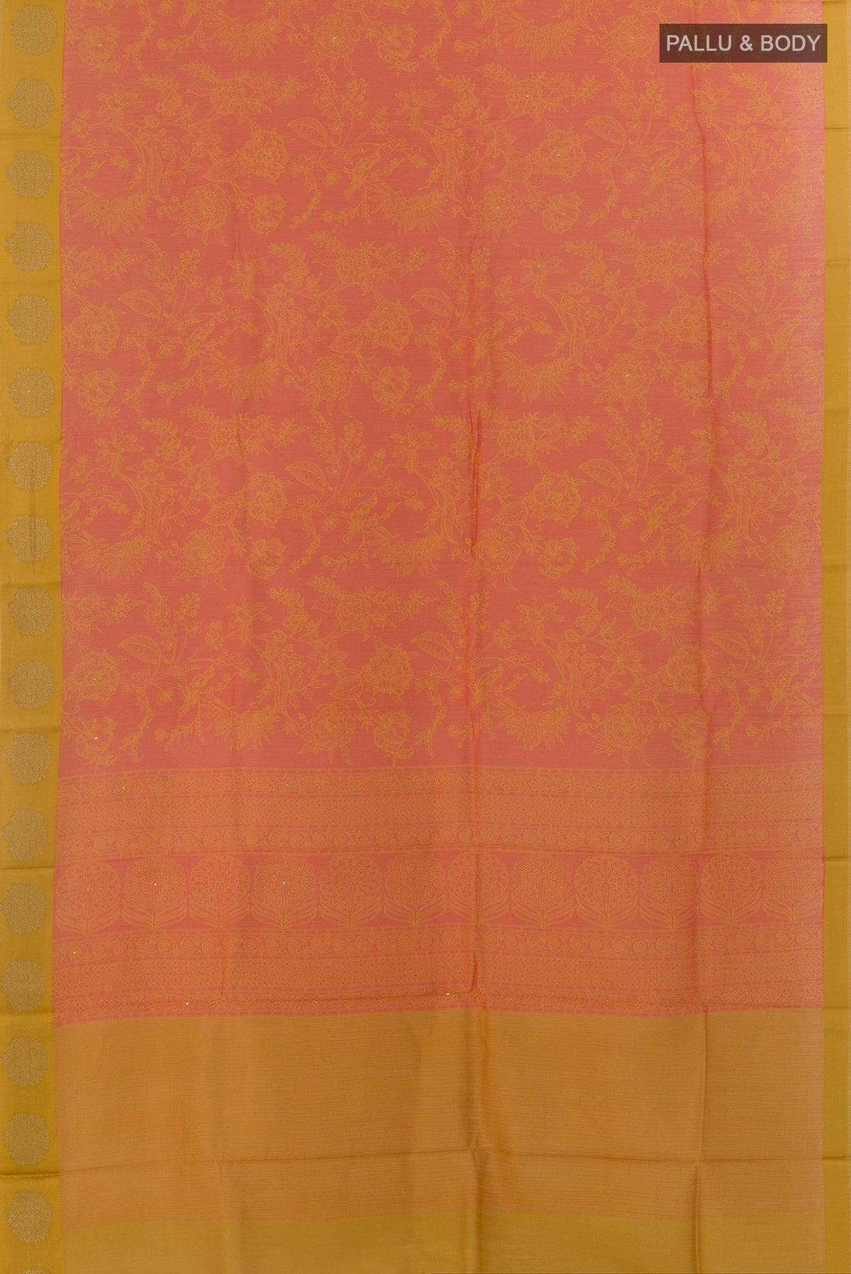 Flat view of Peach Tussar Saree with Printed design on the body and Zari Border. 