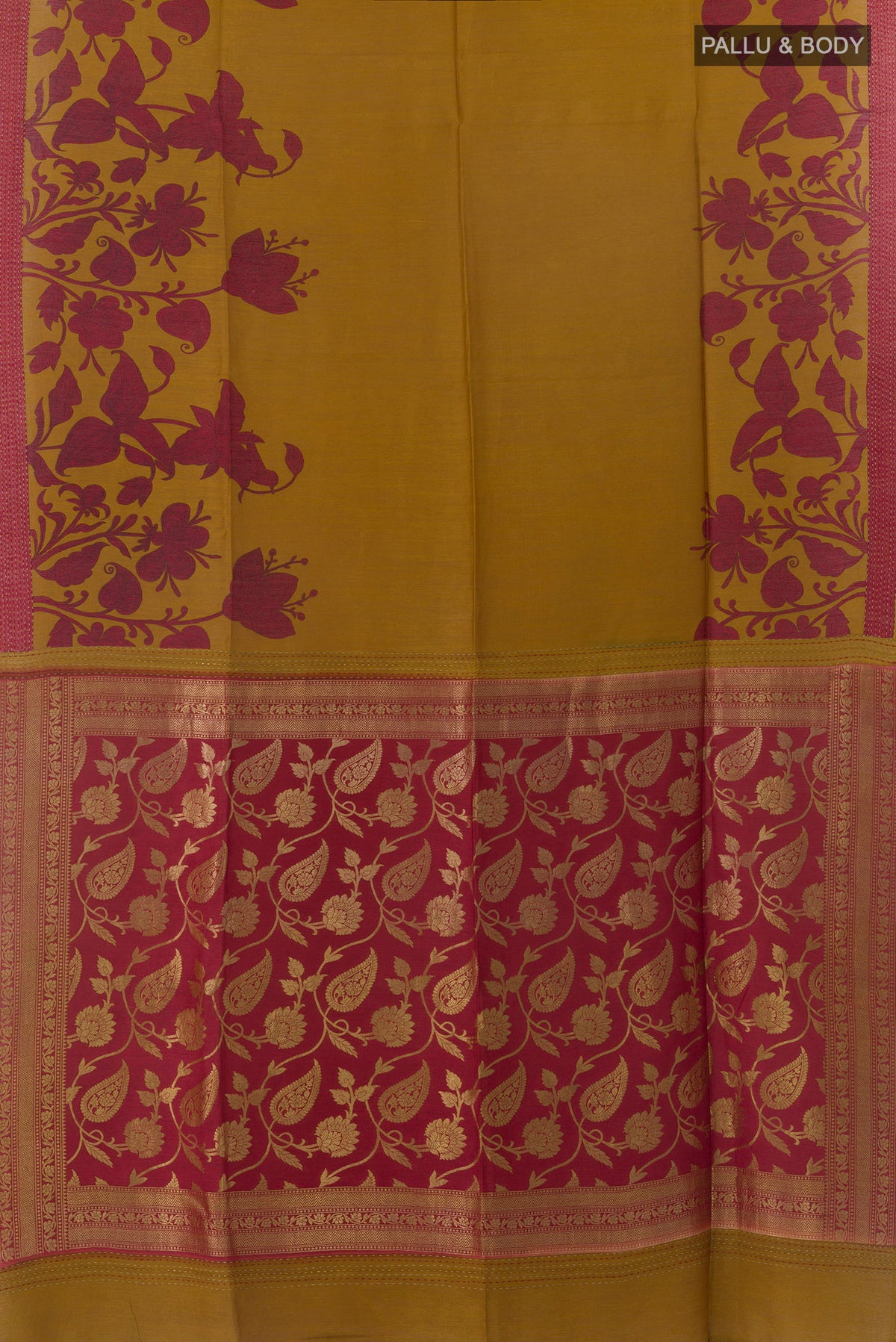 Flat view of Mustard Tussar Saree with Printed design on the body and Zari Border. 