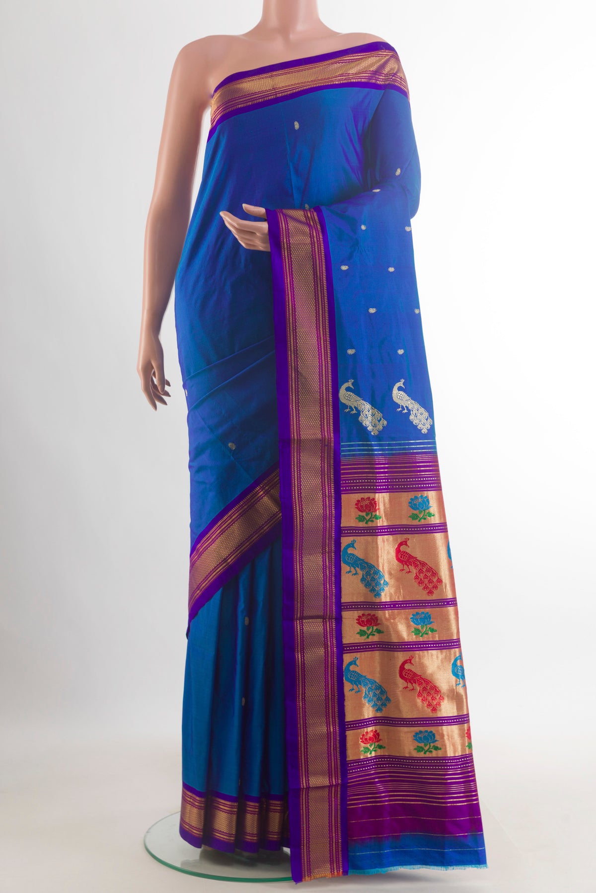 Pure Silk Royal Blue Paithani Saree with Zari Butta on the body and Zari Border.  displayed on a mannequin