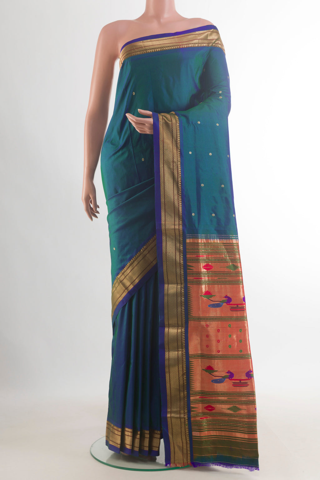 Pure Silk Peacock Blue Dual Tone Paithani Saree with Zari Butta on the body and Zari Border.  displayed on a mannequin