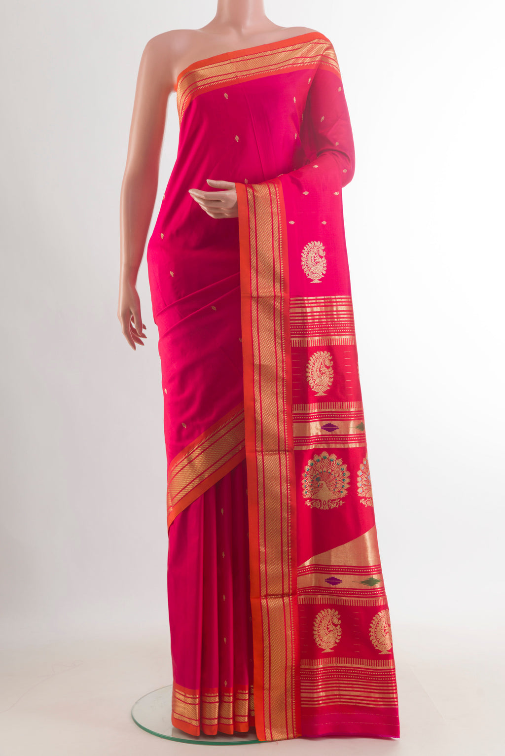 Pure Silk Pink Paithani Saree with Zari Butta on the body and Zari Border.  displayed on a mannequin
