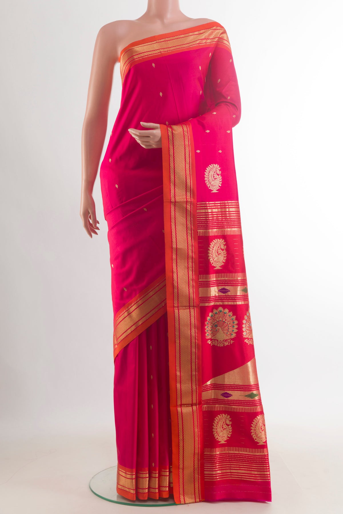 Pure Silk Pink Paithani Saree with Zari Butta on the body and Zari Border.  displayed on a mannequin