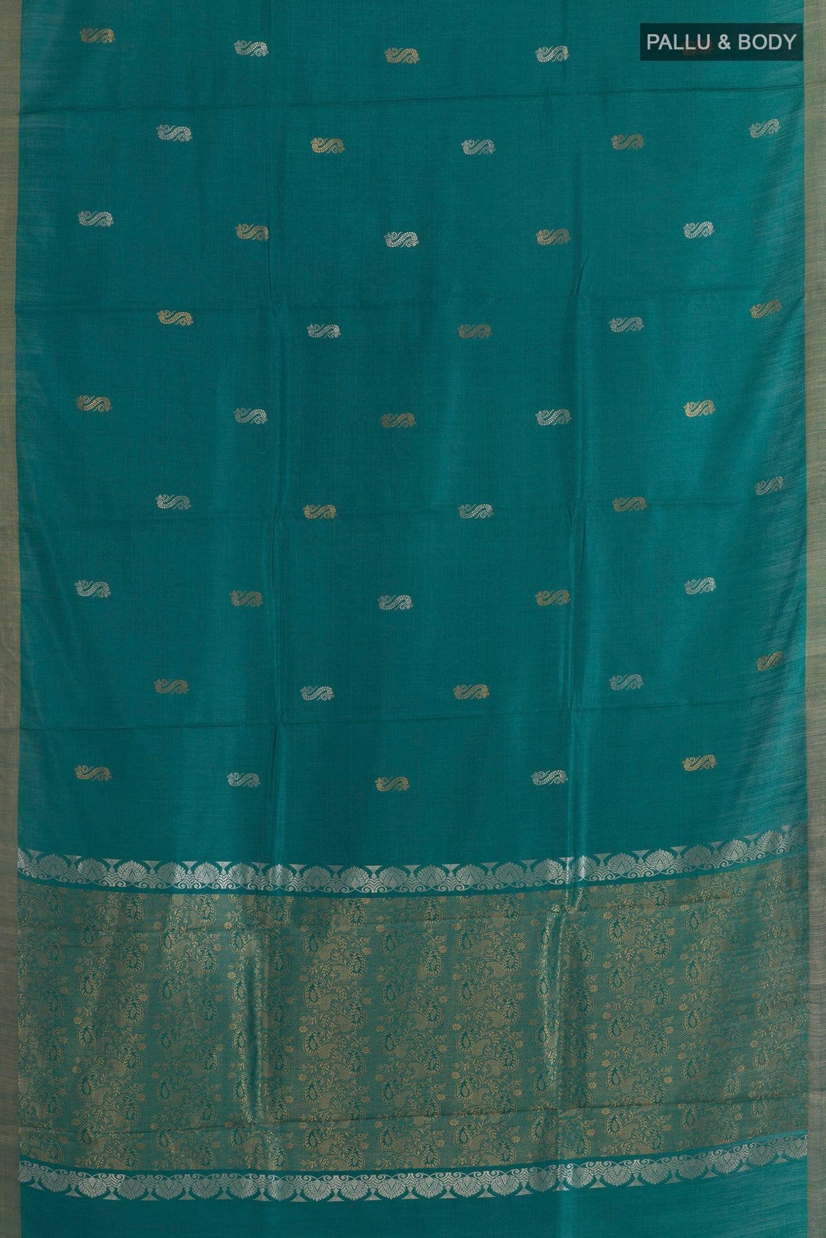 Flat view of Teal Tussar Saree with Zari Butta on the body and Zari Border. 