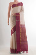 Off White Tussar Saree with Plain Body and Zari Border.  displayed on a mannequin