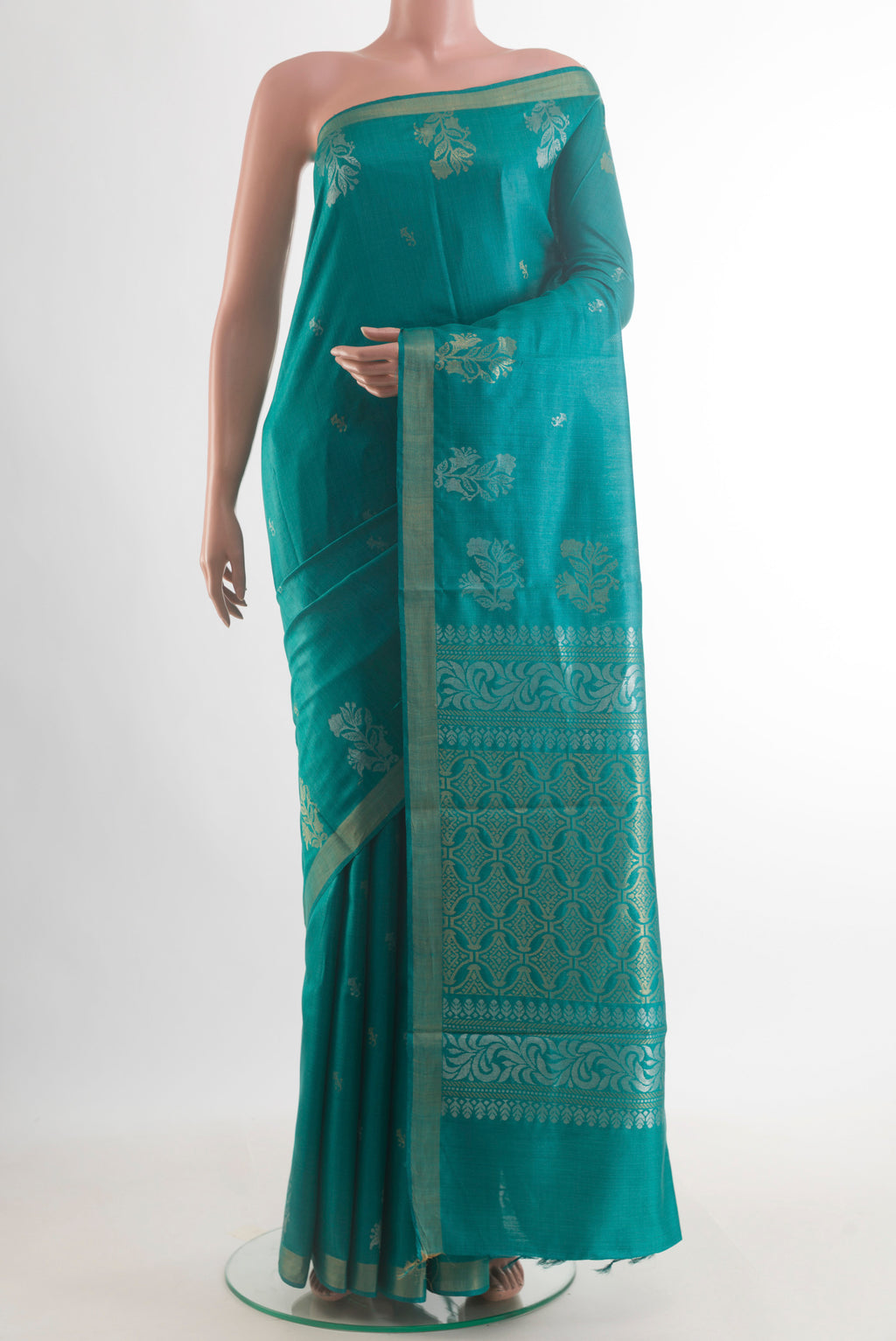 Blue Tussar Saree with Zari Butta on the body and Zari Border.  displayed on a mannequin