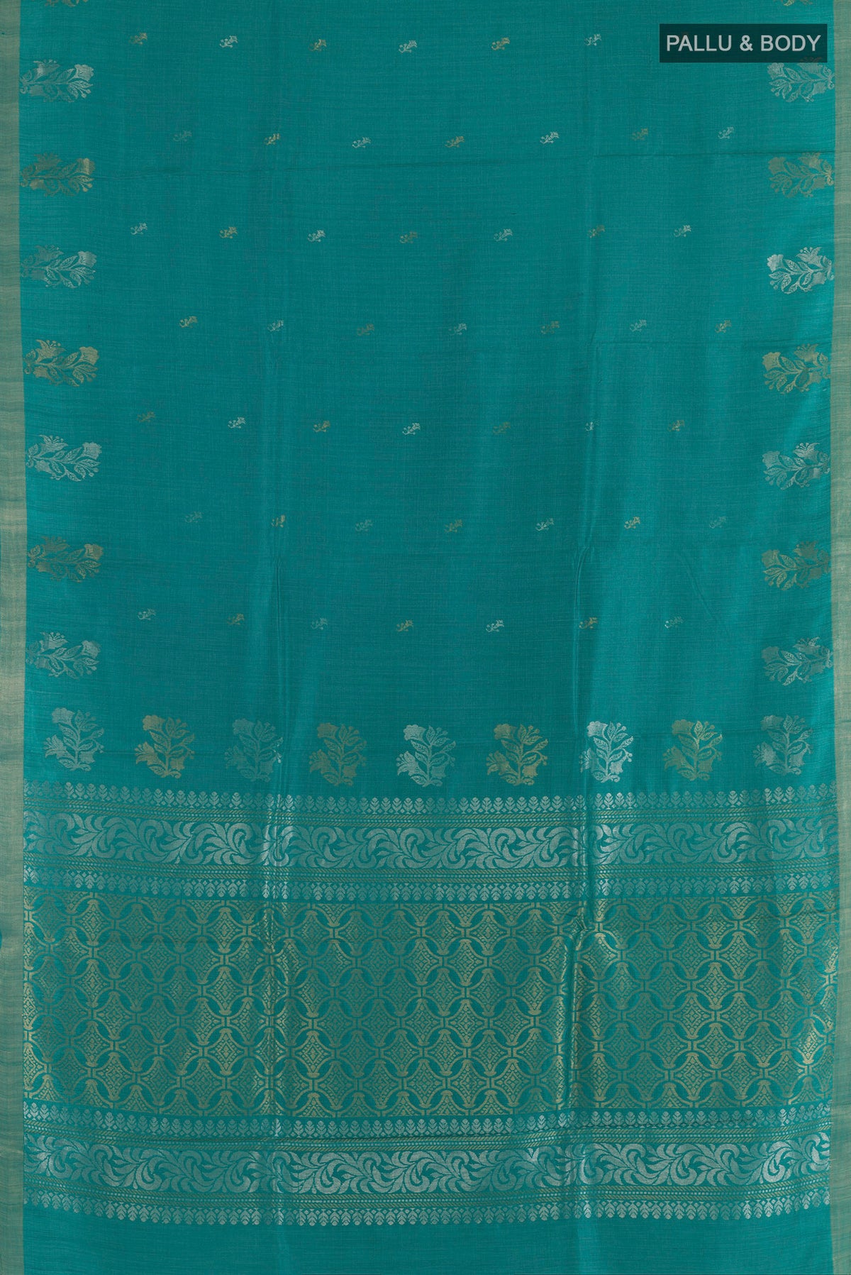 Flat view of Blue Tussar Saree with Zari Butta on the body and Zari Border. 