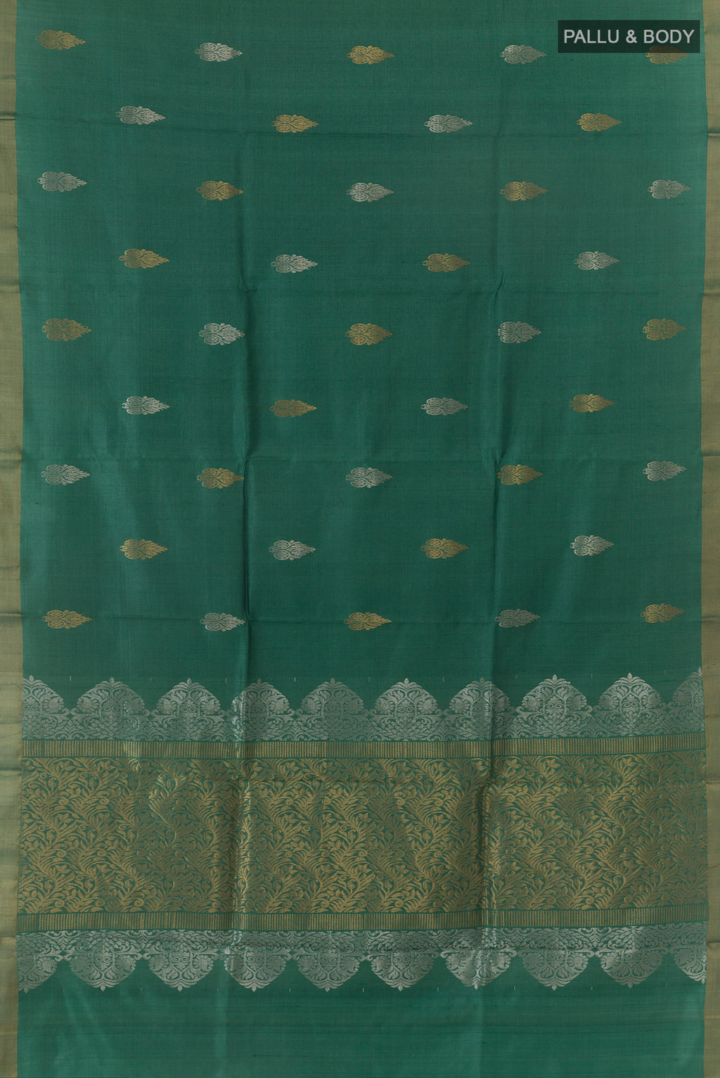 Flat view of Green Tussar Saree with Zari Butta on the body and Zari Border. 