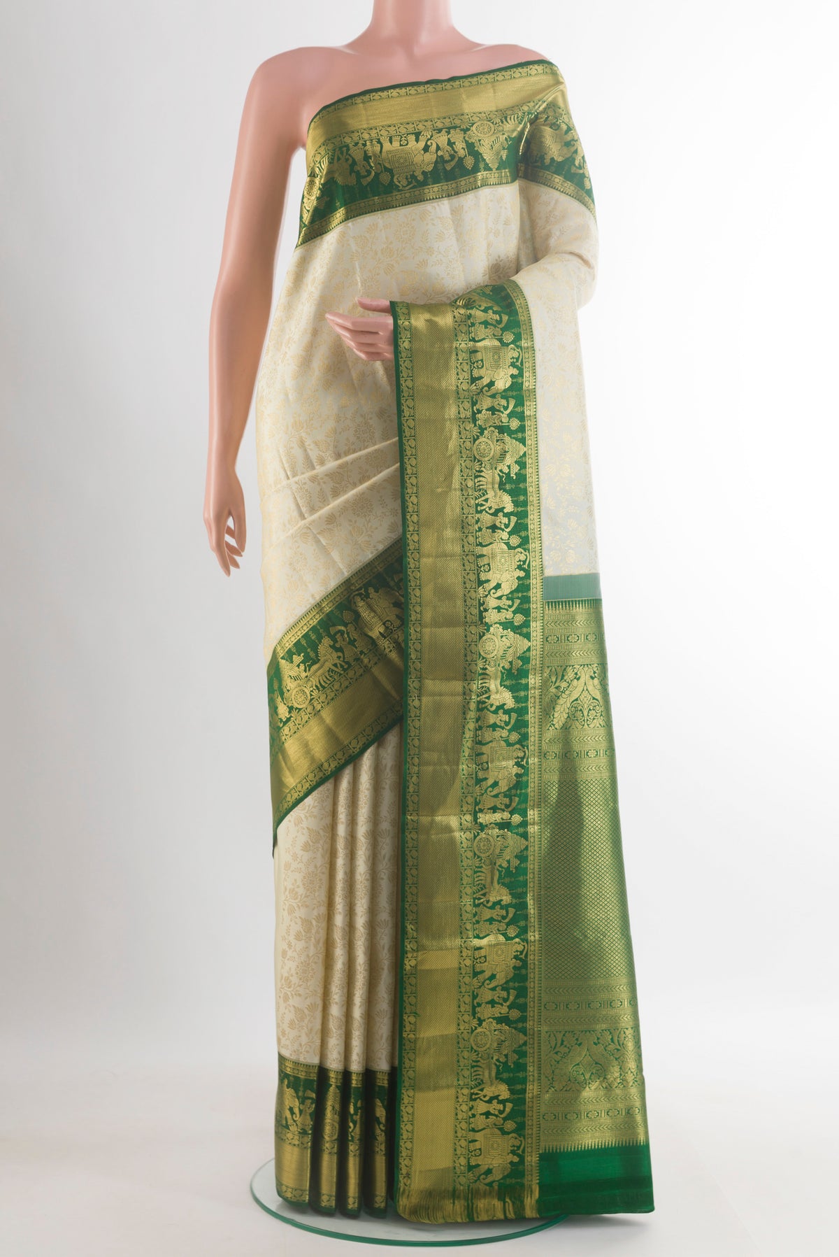 Pure Silk Off White Kanjivaram Saree with Zari Brocade on the body and Zari Border.  displayed on a mannequin