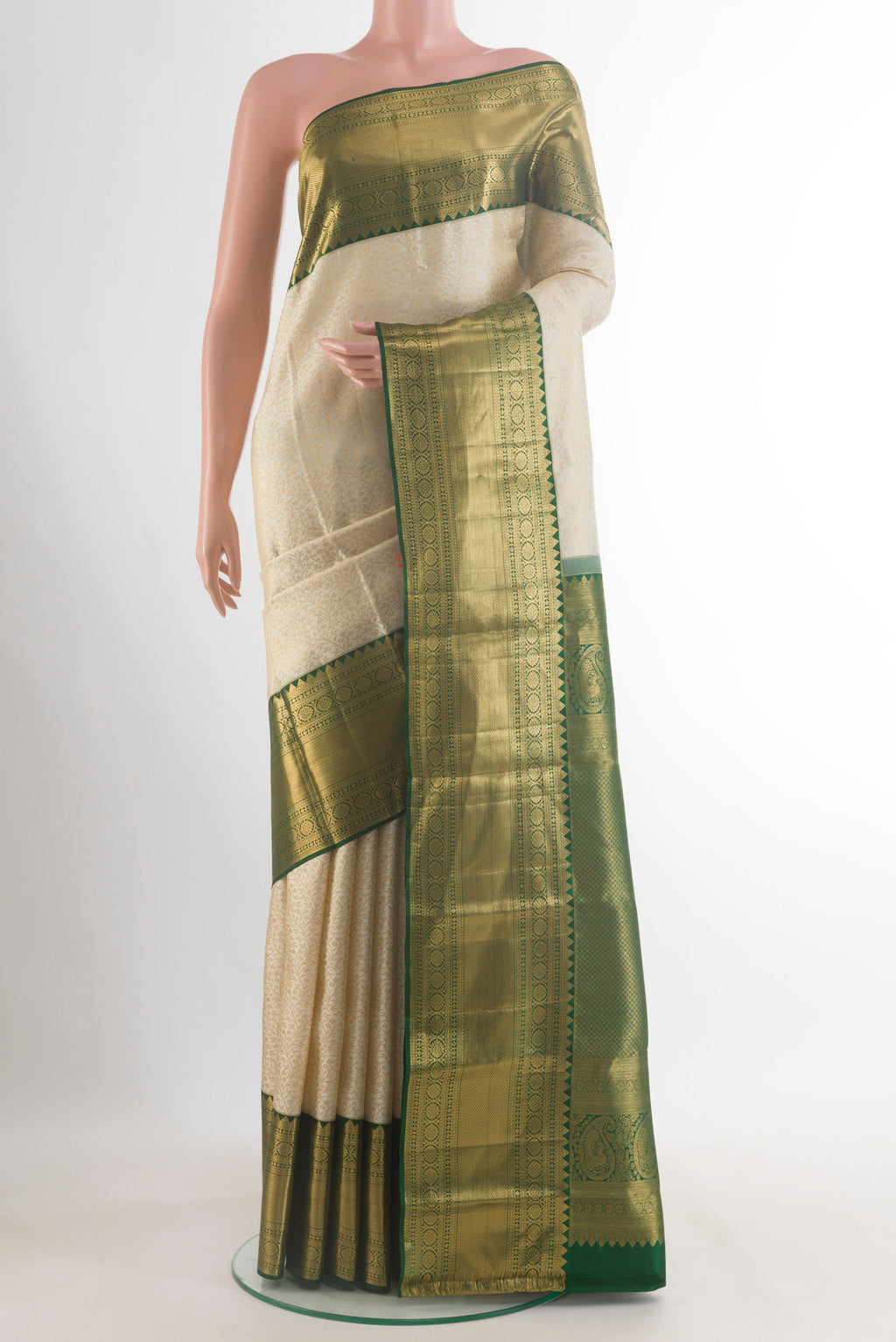 Pure Silk Off White Kanjivaram Saree with Zari Brocade on the body and Zari Border.  displayed on a mannequin