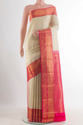 Pure Silk Off White Kanjivaram Saree with Zari Brocade on the body and Zari Border.  displayed on a mannequin