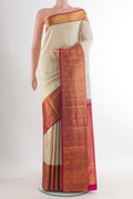 Pure Silk Off White Kanjivaram Saree with Zari Brocade on the body and Zari Border.  displayed on a mannequin