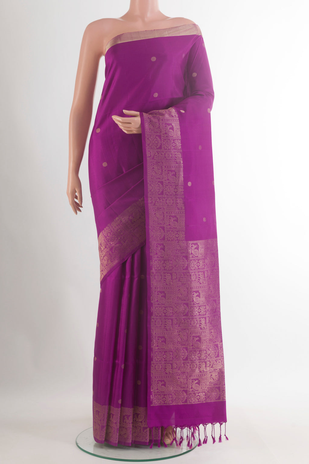 Pure Silk Purple Soft Saree with Zari Butta on the body and Zari Border.  displayed on a mannequin