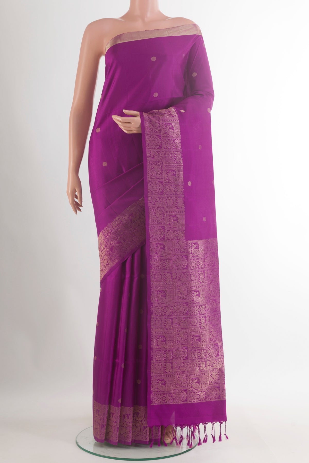 Pure Silk Purple Soft Saree with Zari Butta on the body and Zari Border.  displayed on a mannequin