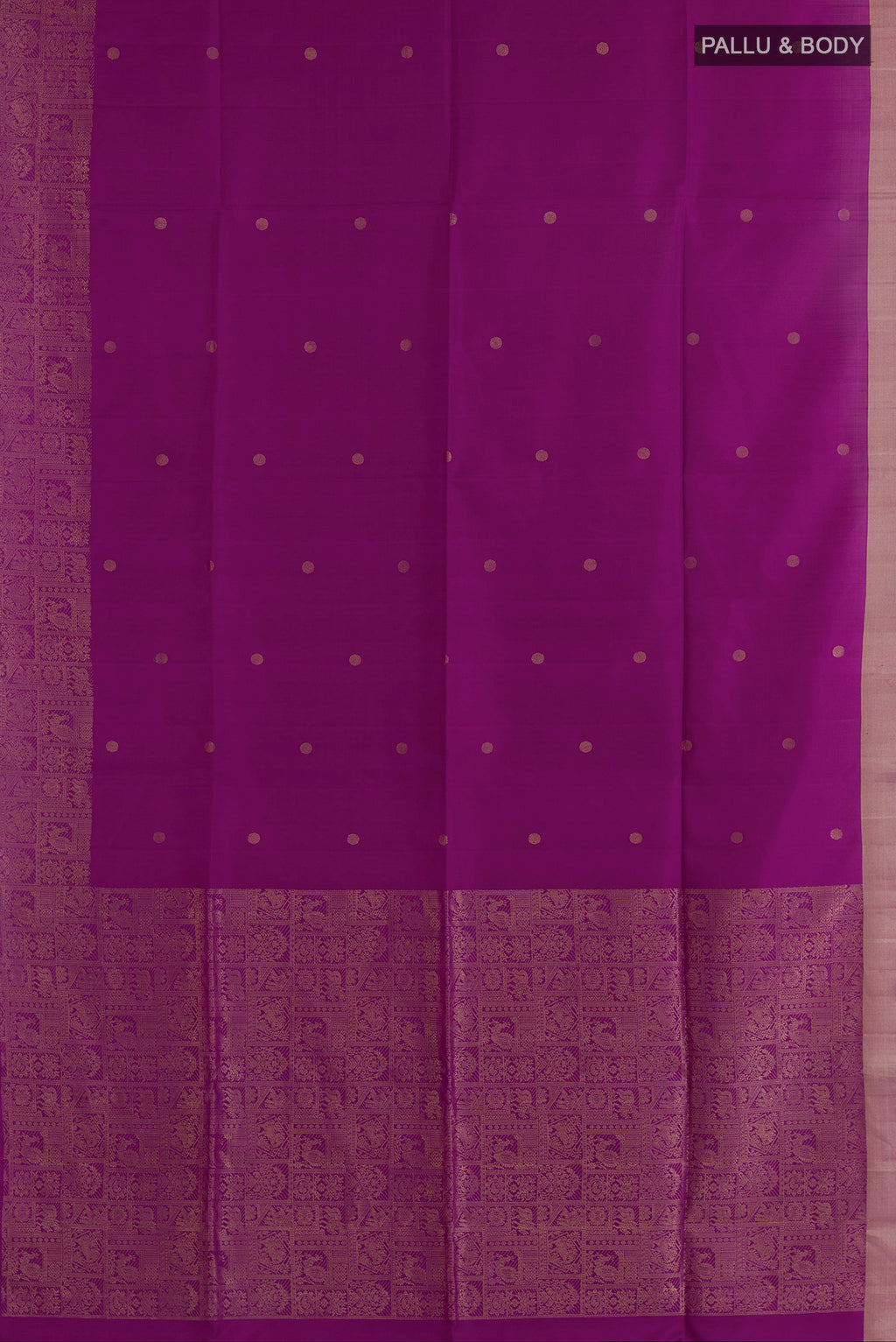 Flat view of Pure Silk Purple Soft Saree with Zari Butta on the body and Zari Border. 