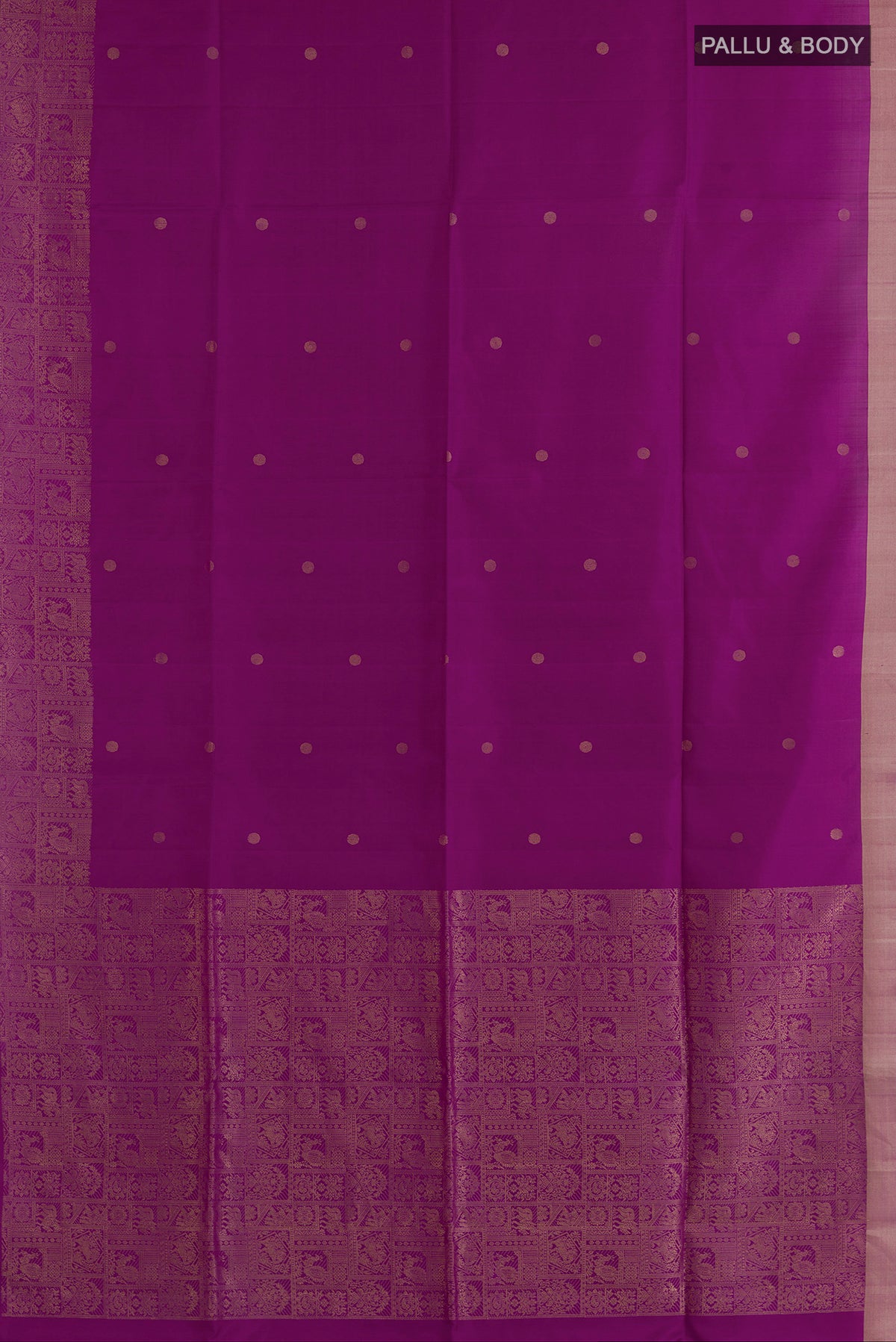 Flat view of Pure Silk Purple Soft Saree with Zari Butta on the body and Zari Border. 