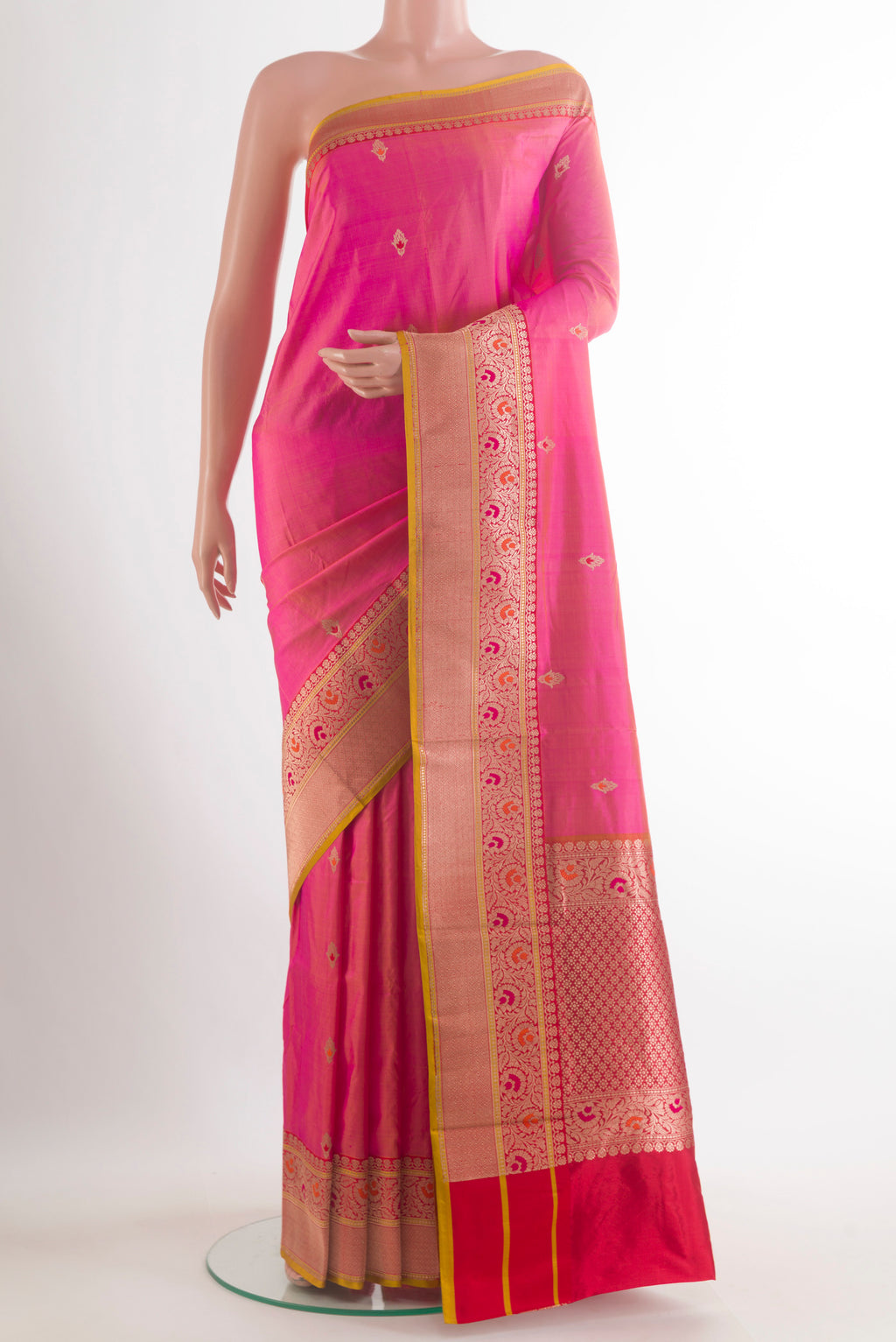 Pure Silk Pink Banarasi Katan Saree with Zari Butta on the body and Zari Border.  displayed on a mannequin