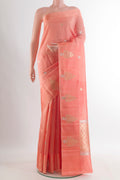 Pure Silk Peach Banarasi Katan Saree with Zari Butta on the body and Zari Border.  displayed on a mannequin