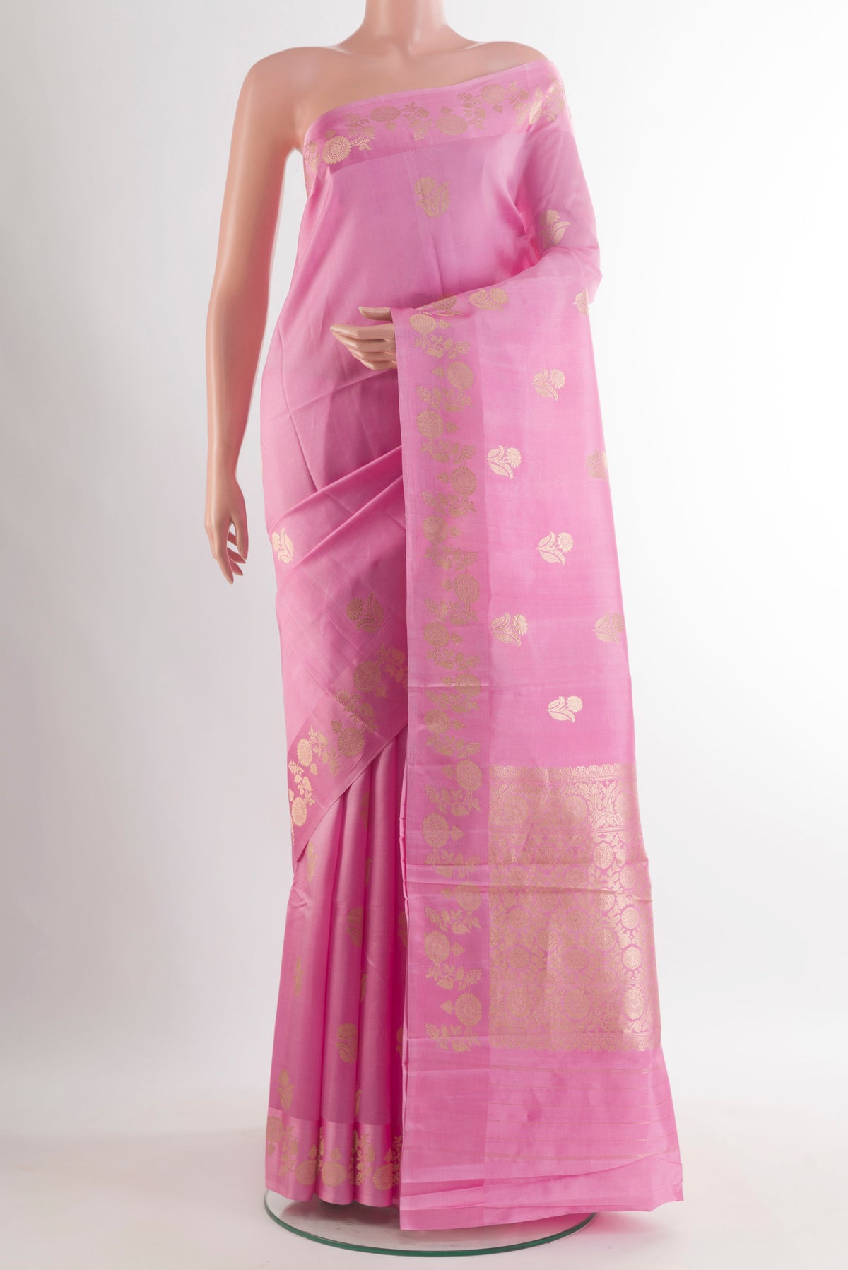 Pure Silk Pink Banarasi Katan Saree with Zari Butta on the body and Zari Border.  displayed on a mannequin