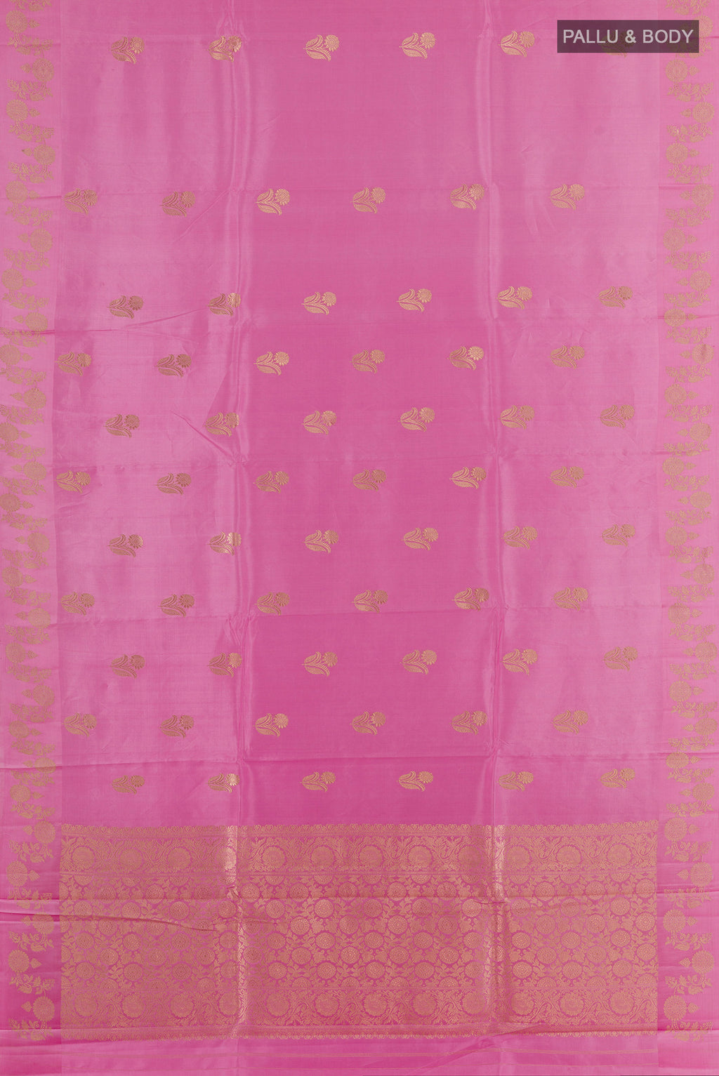Flat view of Pure Silk Pink Banarasi Katan Saree with Zari Butta on the body and Zari Border. 
