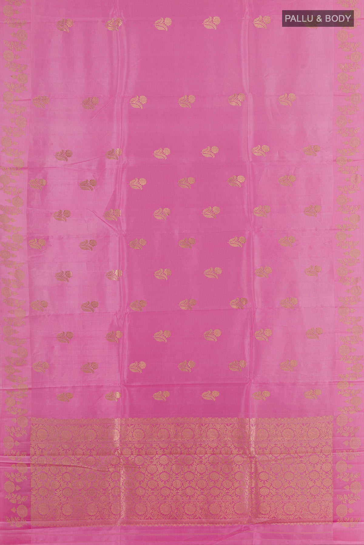 Flat view of Pure Silk Pink Banarasi Katan Saree with Zari Butta on the body and Zari Border. 
