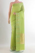 Pure Silk Green Banarasi Katan Saree with Stripes on the body and Zari Border.  displayed on a mannequin