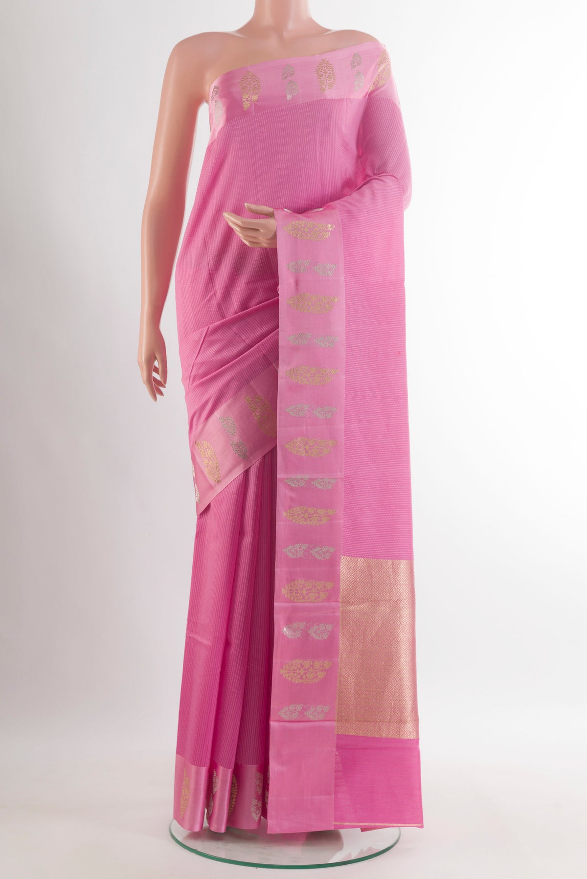 Pure Silk Pink Banarasi Katan Saree with Stripes on the body and Zari Border.  displayed on a mannequin