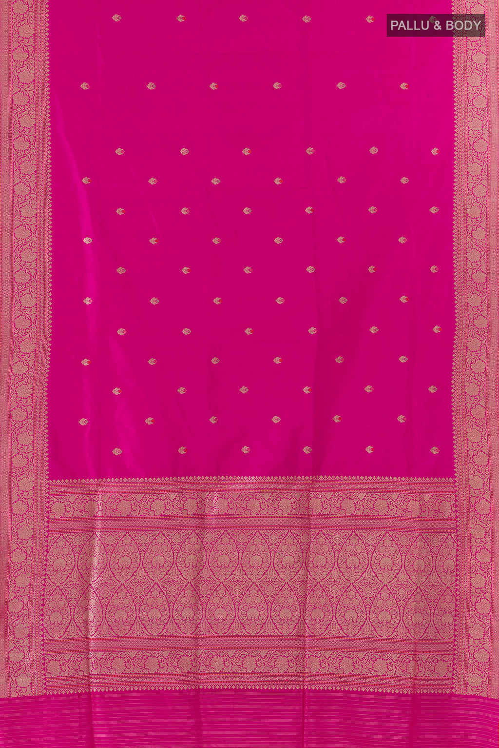 Flat view of Pure Silk Rani Pink Banarasi Saree with Zari Butta on the body and Zari Border. 