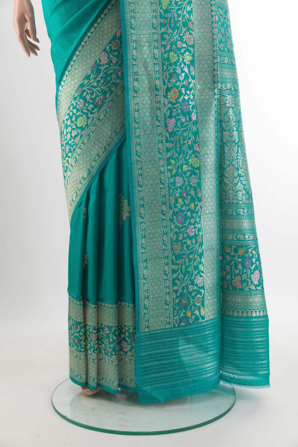 Pleats and pallu of Pure Silk Sea Green Banarasi Tussar Saree with Zari Butta on the body and Zari Border. 