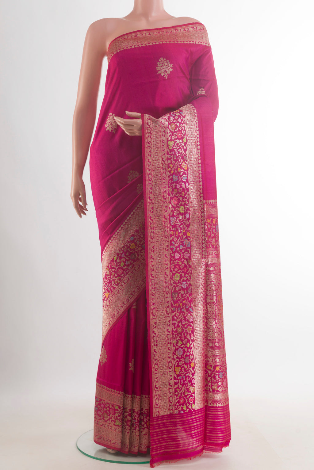 Dark Pink Banarasi Tussar Saree with Zari Butta on the body and Zari Border.  displayed on a mannequin