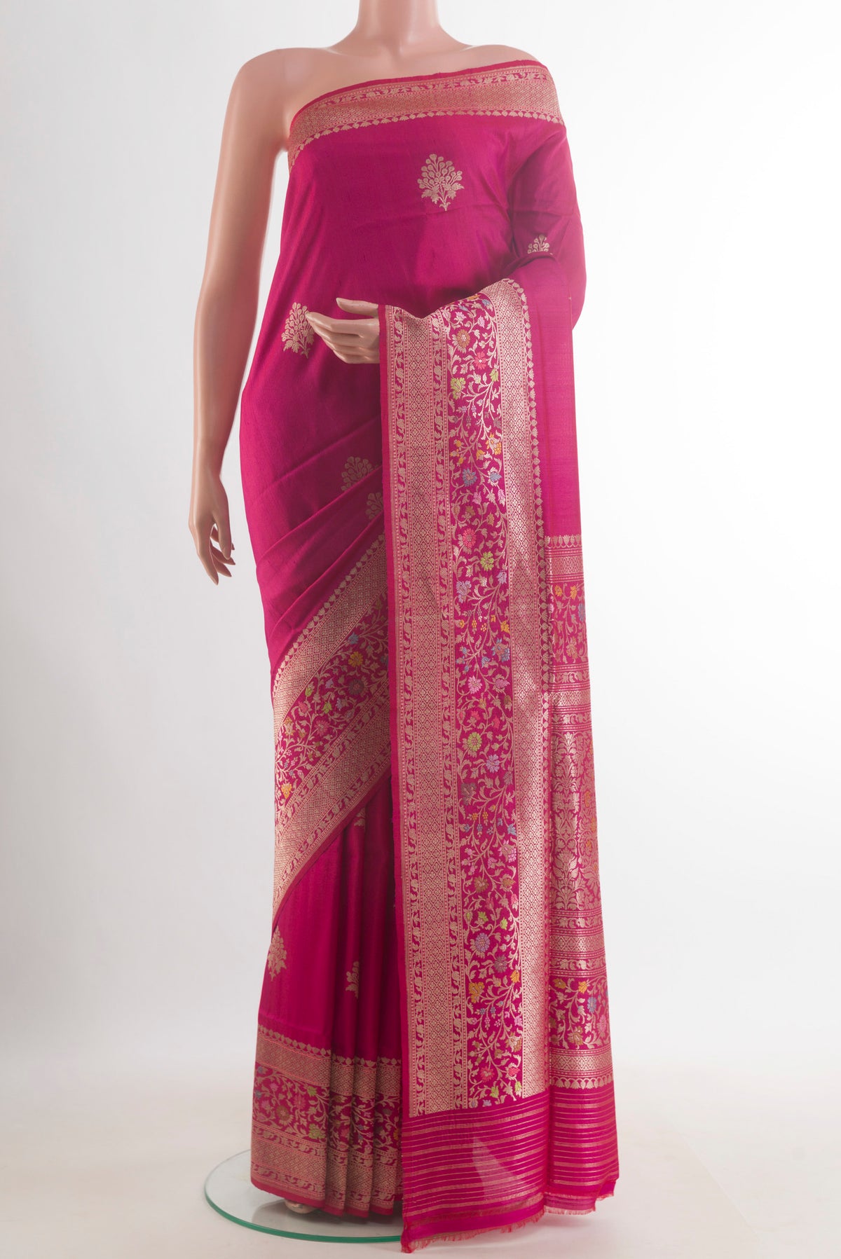 Dark Pink Banarasi Tussar Saree with Zari Butta on the body and Zari Border.  displayed on a mannequin