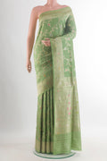 Pure Silk Green Banarasi Tussar Saree with Zari Brocade on the body and Zari Border.  displayed on a mannequin