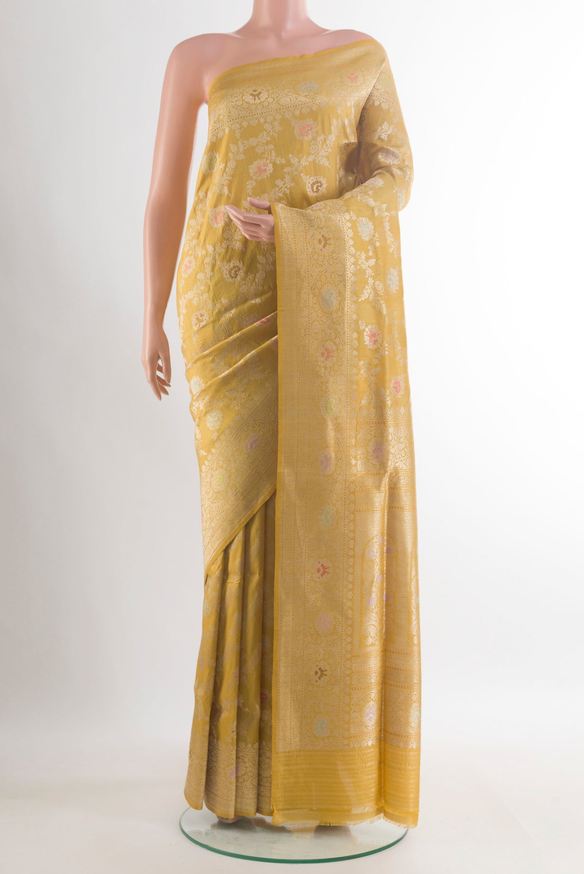 Pure Silk Yellow Banarasi Saree with Zari Brocade on the body and Zari Border.  displayed on a mannequin