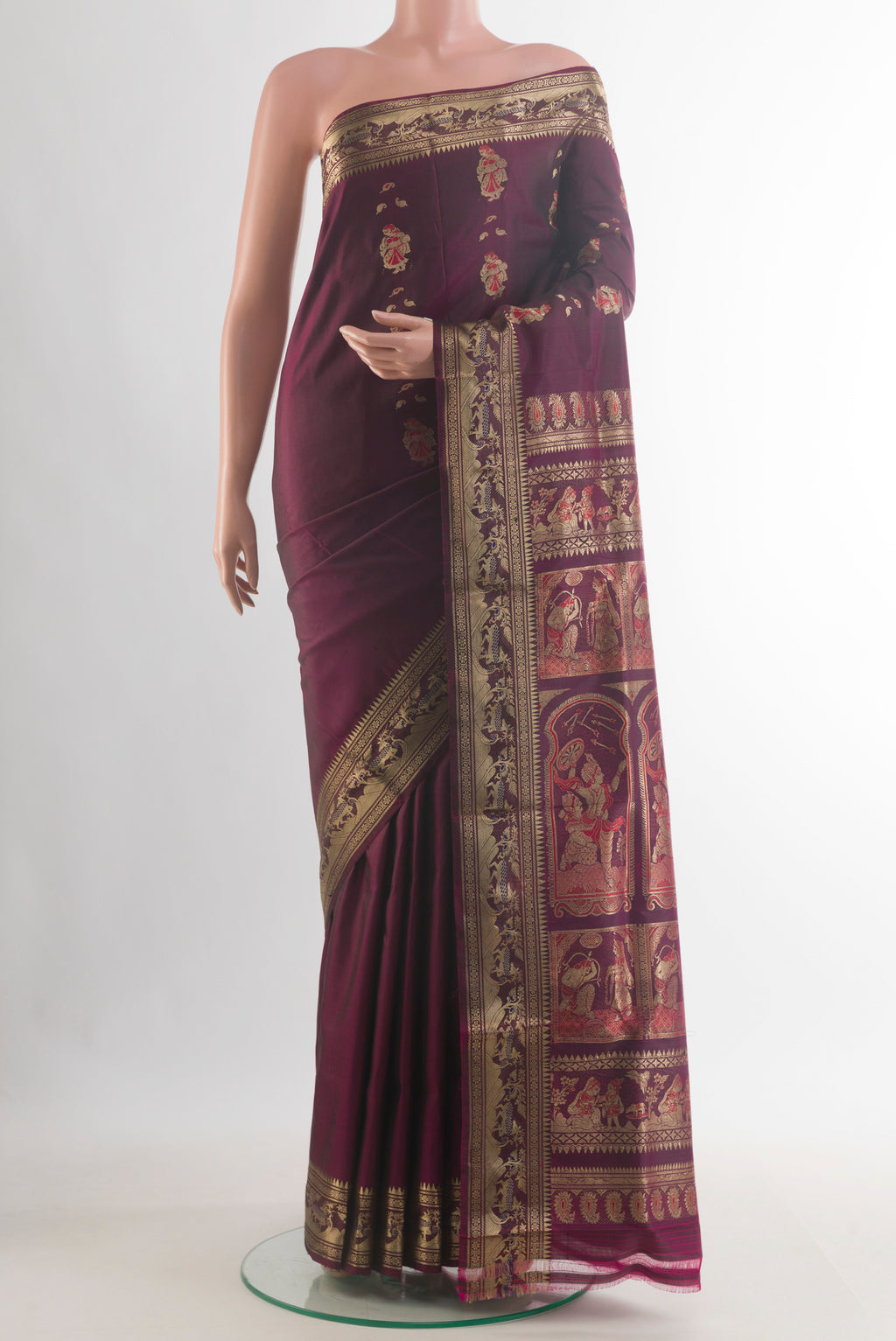 Pure Silk Coffee Brown Baluchari Saree with Zari Butta on the body and Zari Border.  displayed on a mannequin