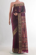 Pure Silk Coffee Brown Baluchari Saree with Zari Butta on the body and Zari Border.  displayed on a mannequin