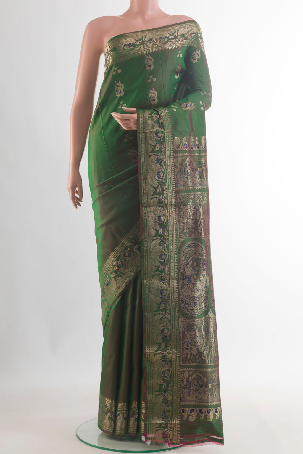 Pure Silk Green Baluchari Saree with Zari Butta on the body and Zari Border.  displayed on a mannequin