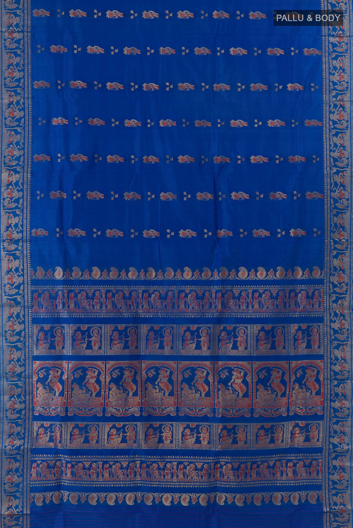 Flat view of Pure Silk Royal Blue Baluchari Saree with Zari And Thread Butta on the body and Zari Border. 