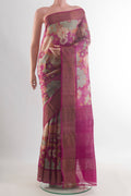 Pink Tussar Saree with Floral Print on the body and Zari Border.  displayed on a mannequin