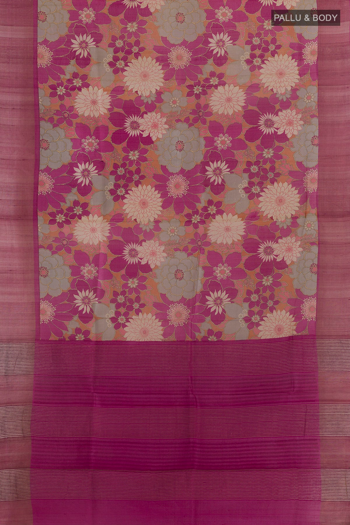 Flat view of Pink Tussar Saree with Floral Print on the body and Zari Border. 