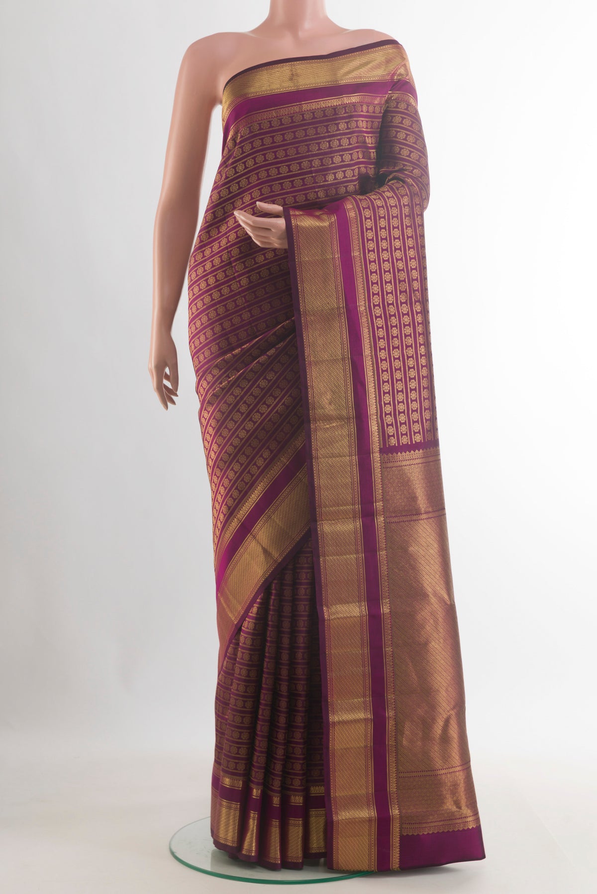 Pure Silk Purple Kanchipuram Saree with Zari Brocade on the body and Zari Border.  displayed on a mannequin
