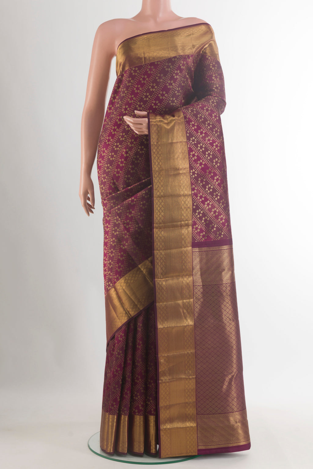 Pure Silk Purple Kanchipuram Saree with Zari Brocade on the body and Zari Border.  displayed on a mannequin
