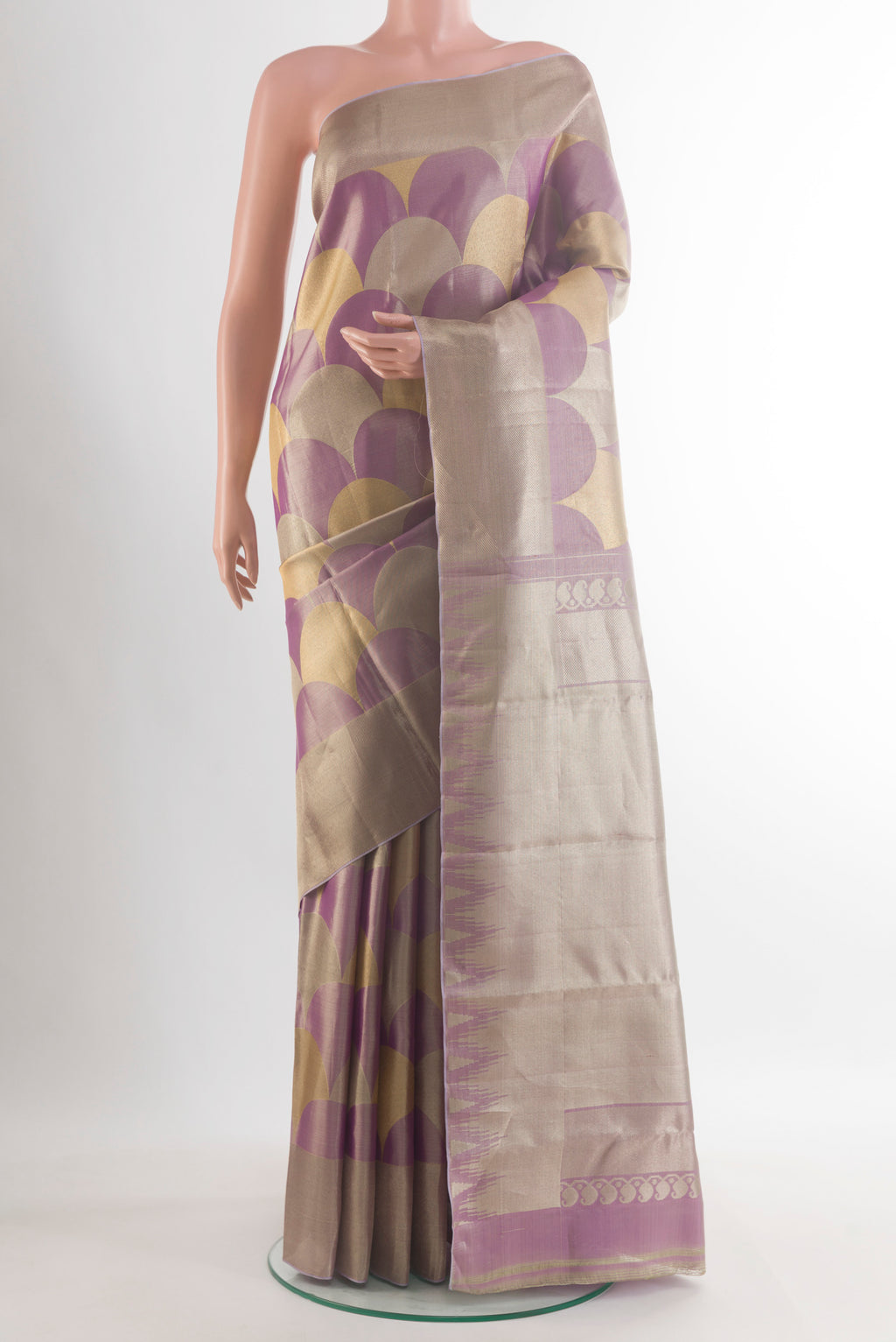 Pure Silk Lavender Kanchipuram Saree with Zari Brocade on the body and Zari Border.  displayed on a mannequin