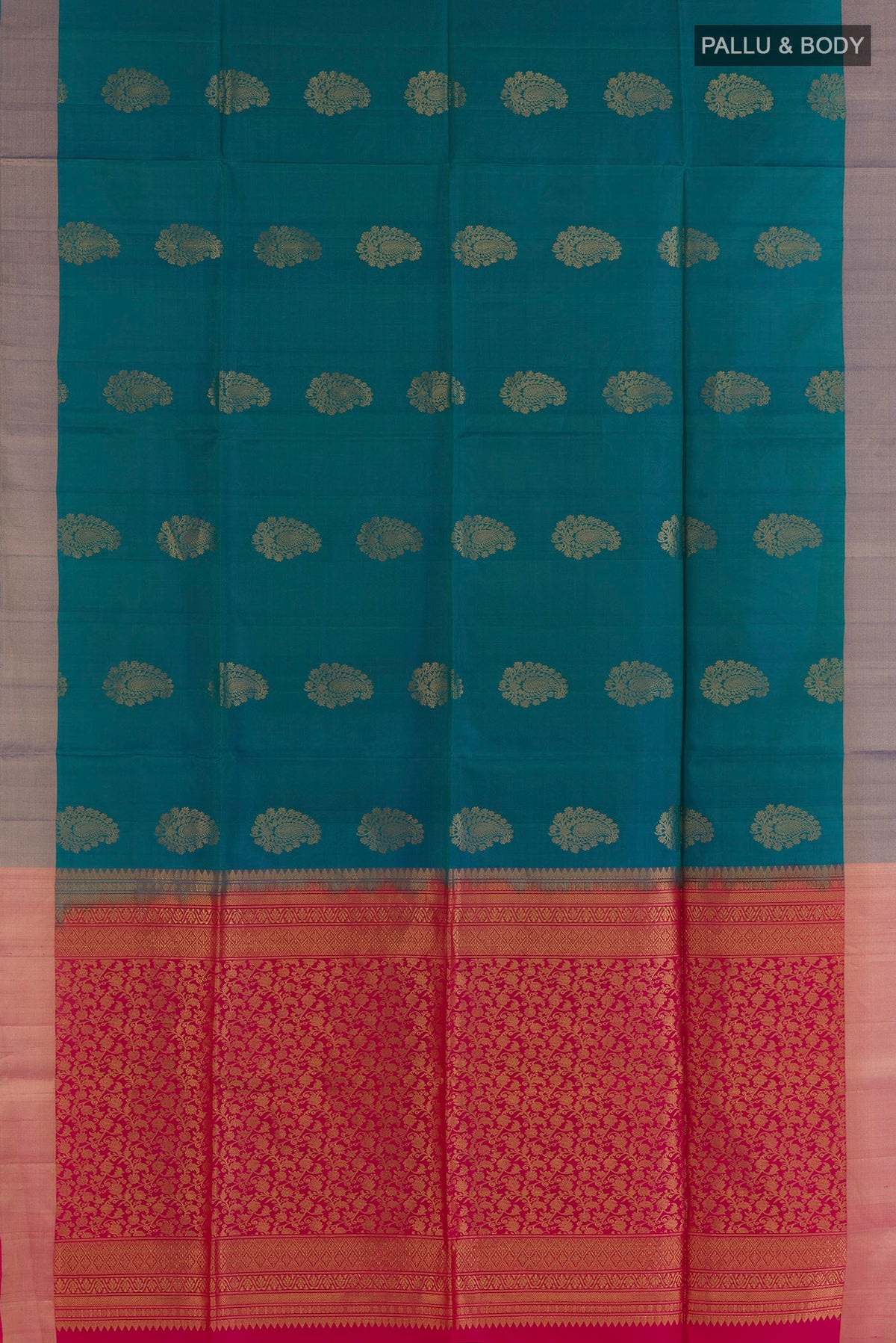 Flat view of Pure Silk Peacock Blue Soft Saree with Zari Butta on the body and Zari Border. 