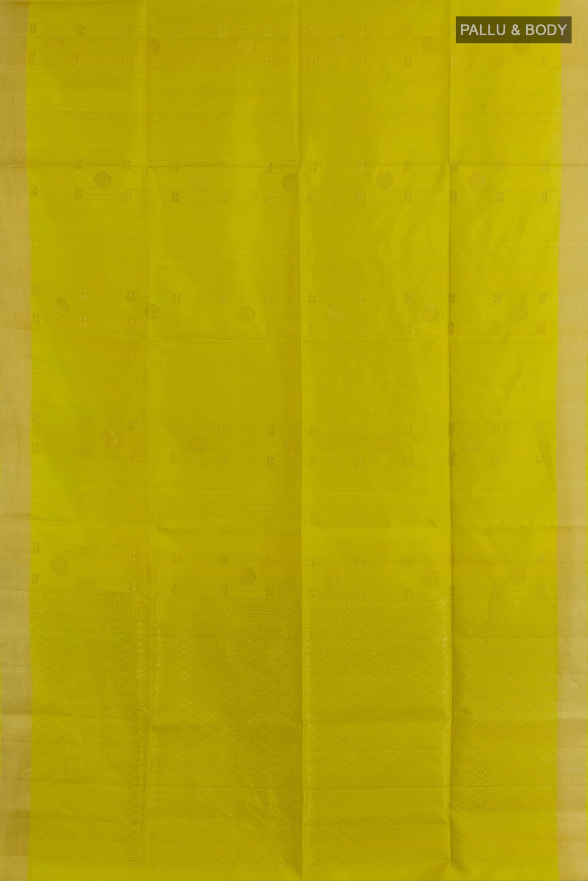 Flat view of Pure Silk Green Soft Saree with Zari Butta on the body and Zari Border. 