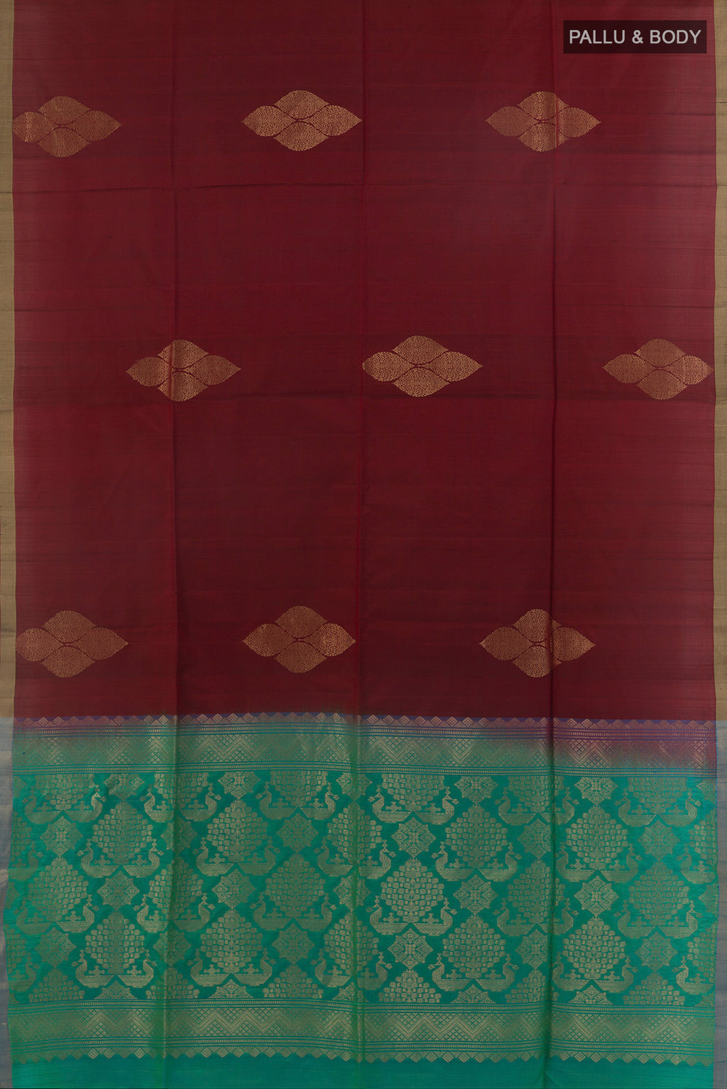 Flat view of Pure Silk Maroon Soft Saree with Zari Butta on the body and Zari Border. 
